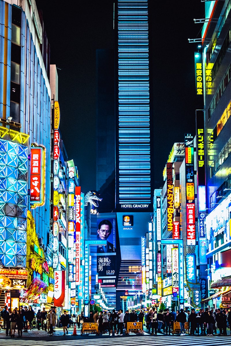 Shibuya Crossing at night with neon lights