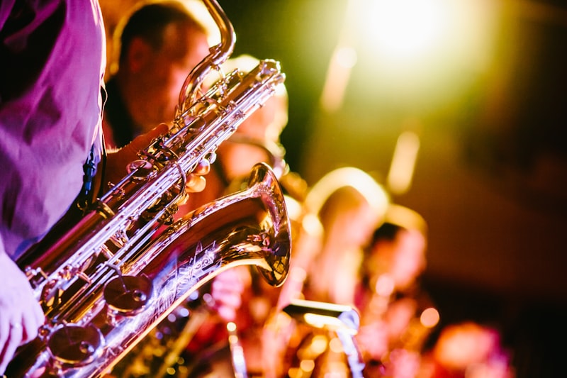 Jazz musician performing on stage in an intimate club setting