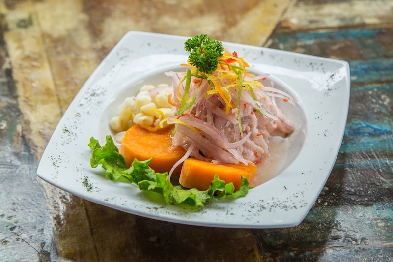 Peruvian ceviche with lime, ají amarillo, and cancha corn