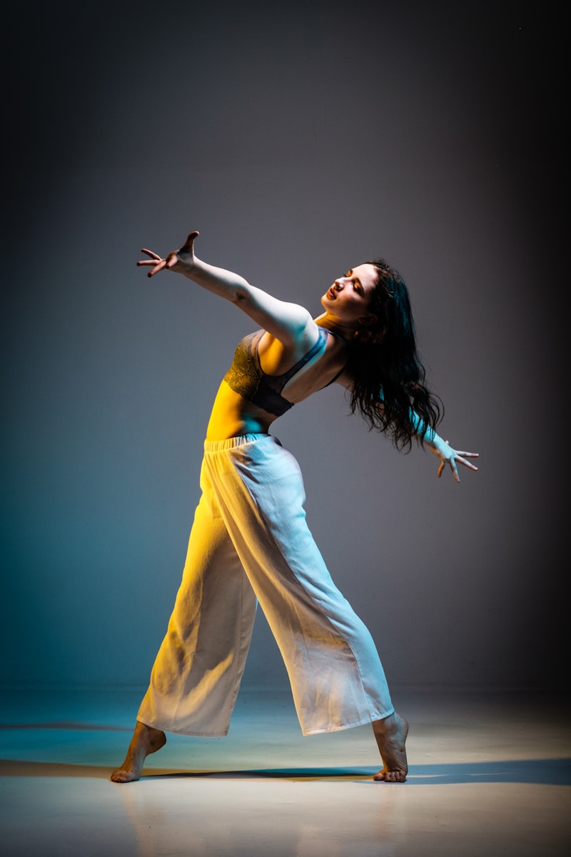 Flamenco dancer in red dress performing on stage