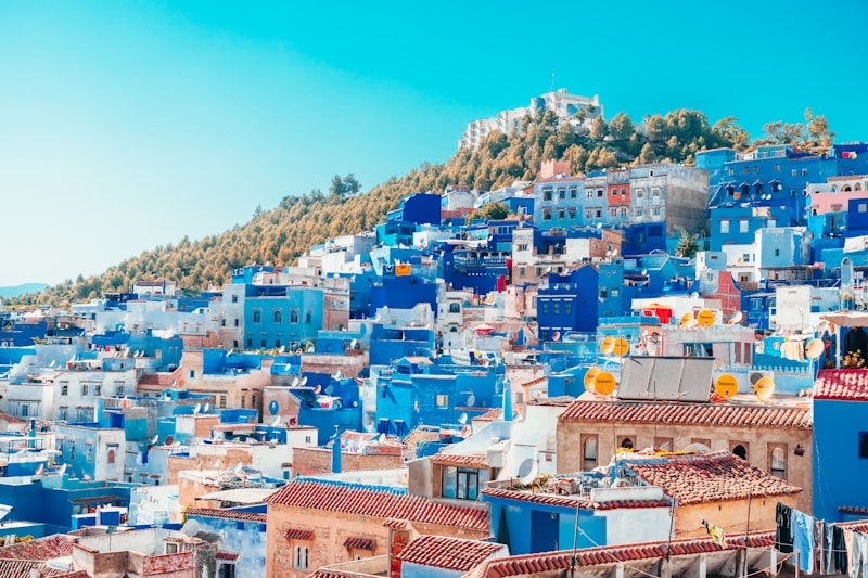 Panoramic view of Chefchaouen blue medina from hilltop Spanish Mosque