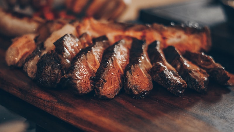 Argentine asado beef cuts grilling over wood fire