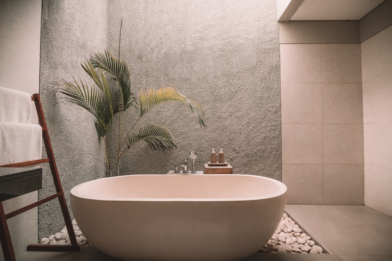 Ornate tiled hammam interior with arched ceilings and steam-filled atmosphere
