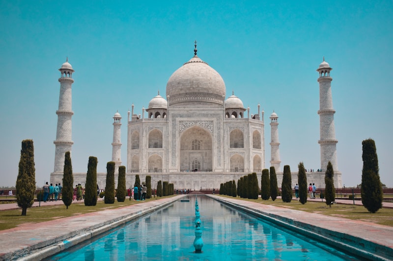 Taj Mahal at sunrise reflected in the reflecting pool