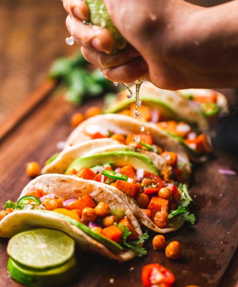 Colorful street tacos with traditional toppings